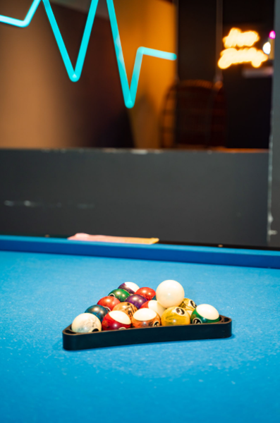 Play pool with your friends at our corporate event space in Singapore